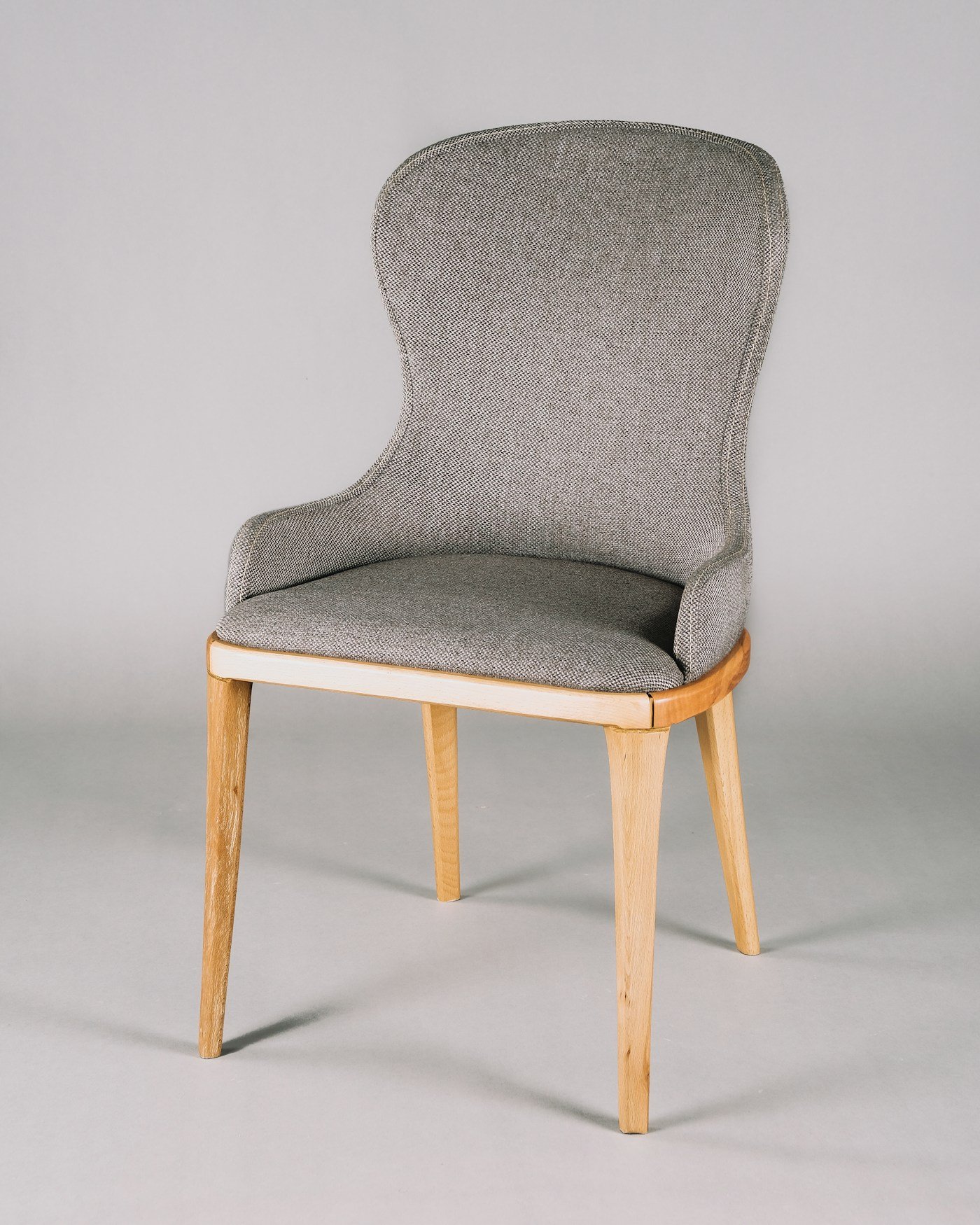 Oak and woven upholstery chair detail